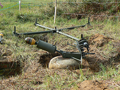 Spigot mortar pedestal with a modern replica